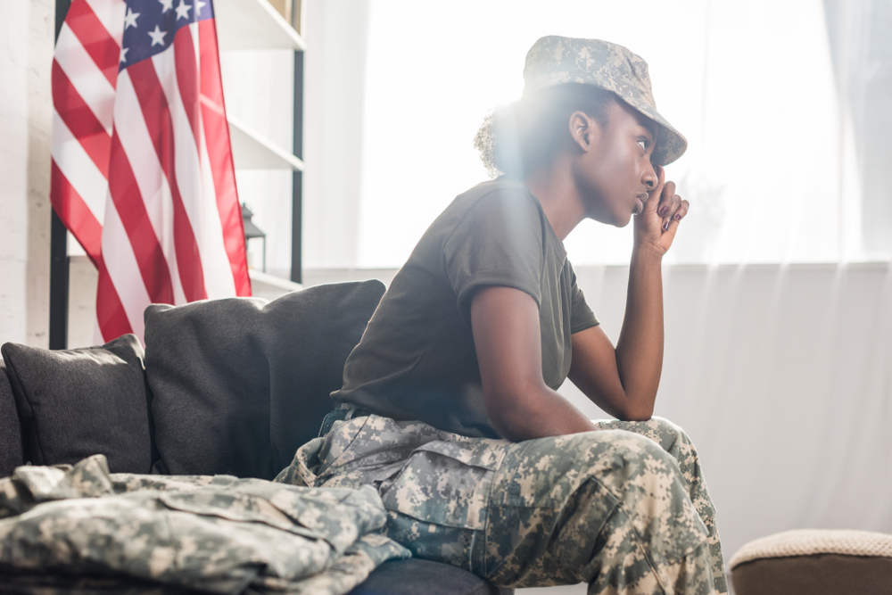 African,American,Female,Soldier,Sitting,On,Sofa